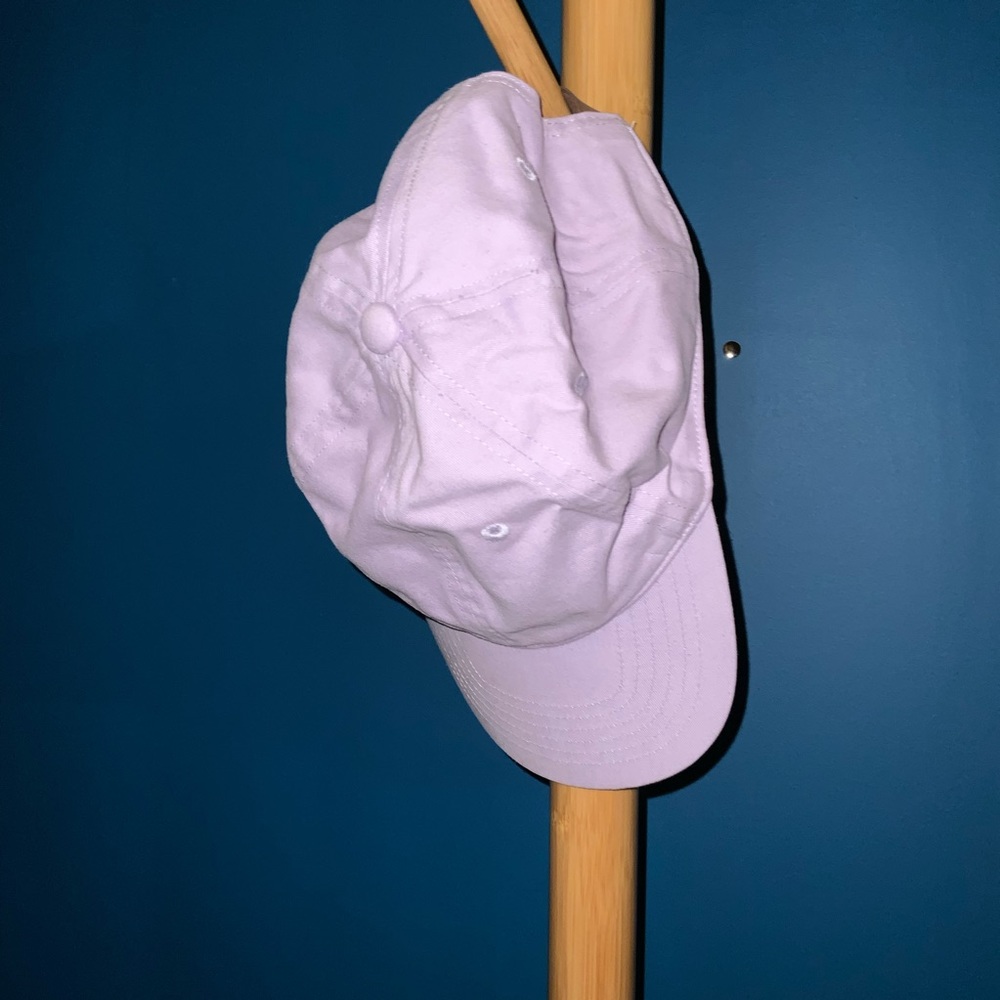 Lavender cap with brown faux leather strap